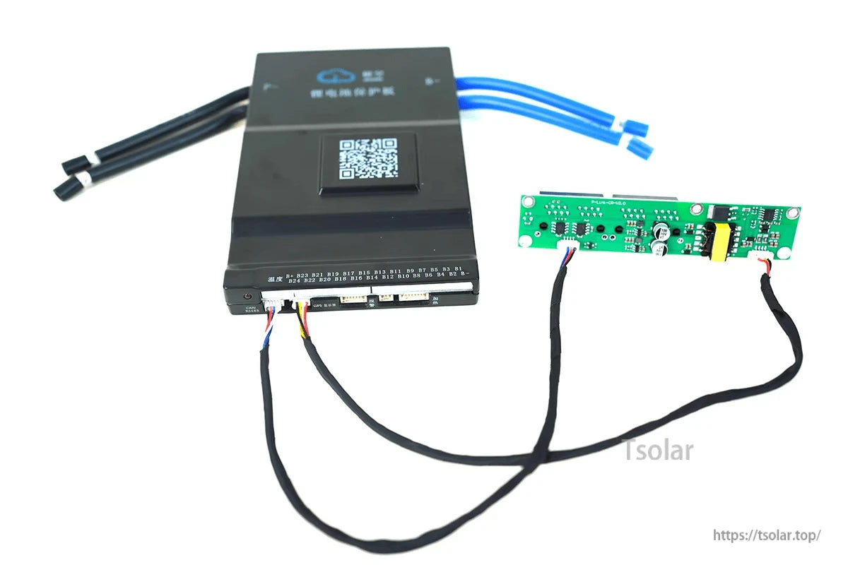 Full setup view with JKBMS device and attached P-Link-CR interface board, cables included