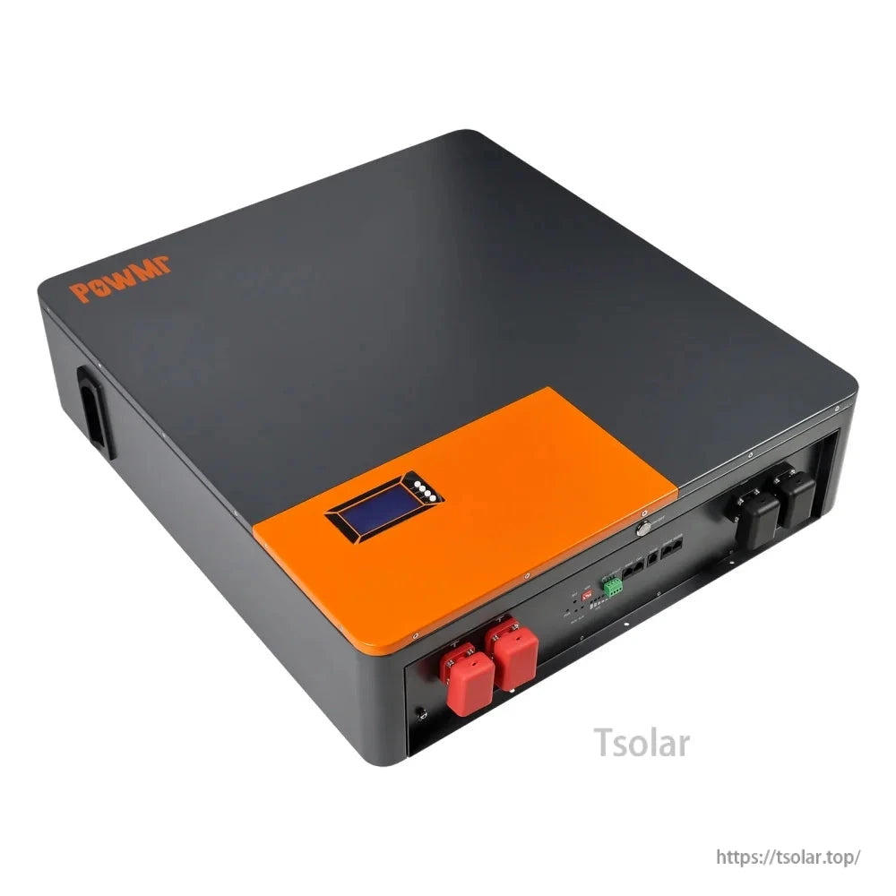 Angled top view highlighting orange cover section and front connection panel with terminals and port cluster