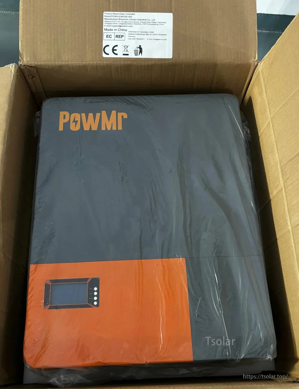 PowMr battery packed in shipping box with protective wrap; product label with CE marking visible on carton flap